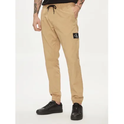 Zdjęcie Calvin Klein Jeans Joggery Monologo Badge J30J325114 Beżowy Skinny Fit