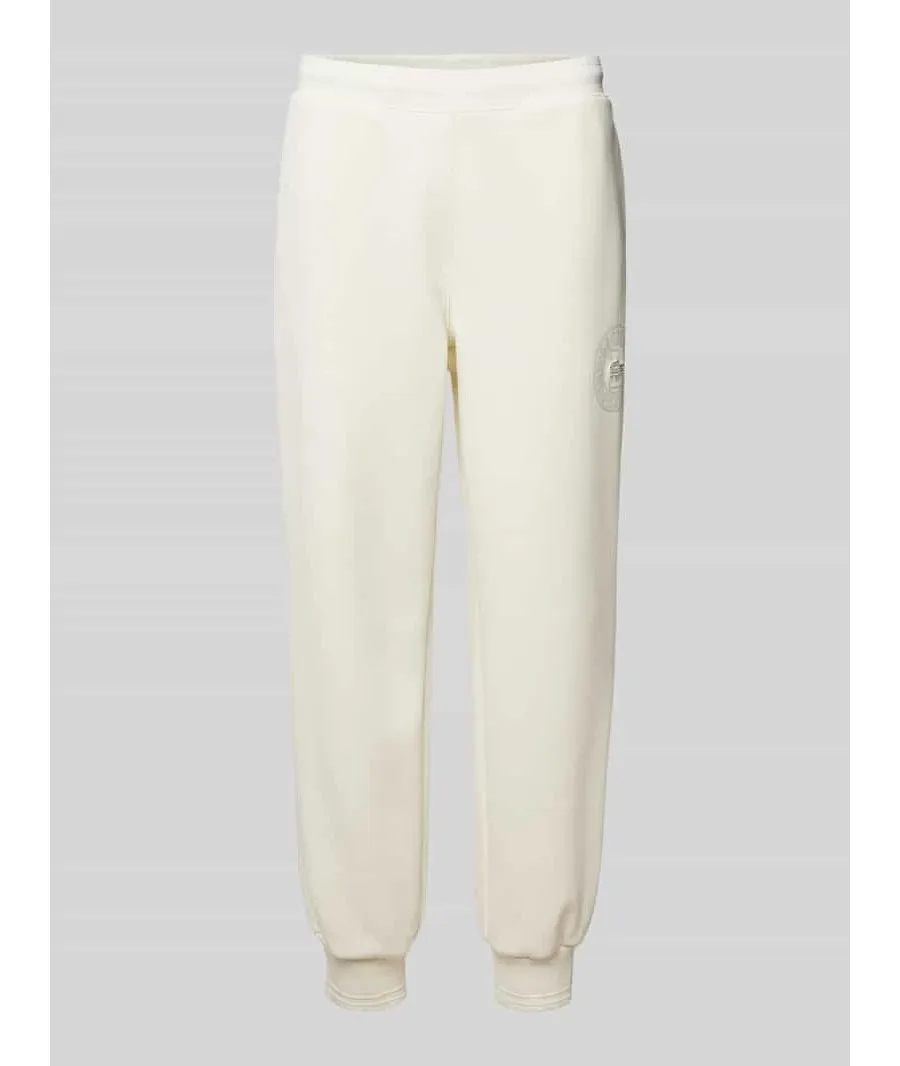 obrazek 1 Spodnie dresowe o kroju relaxed fit z naszywką z logo