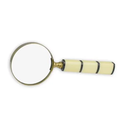 Picture A magnifying glass with a beautiful, cream handle