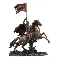 Picture An exclusive decoration in the form of a statuette of a knight on a horse