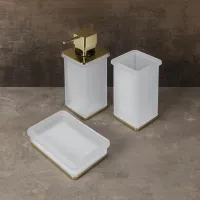 Picture Fantastic bathroom accessories with gold decorations