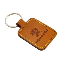 Picture Leather keychain in the shape of a rectangle with a company emblem