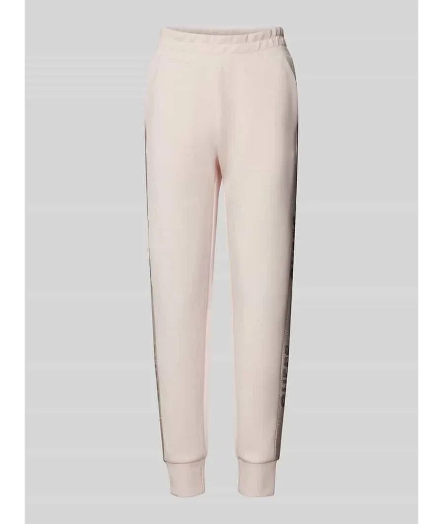 obrazek 1 Guess Spodnie dresowe W5RB00 KBYE2 Różowy Regular Fit