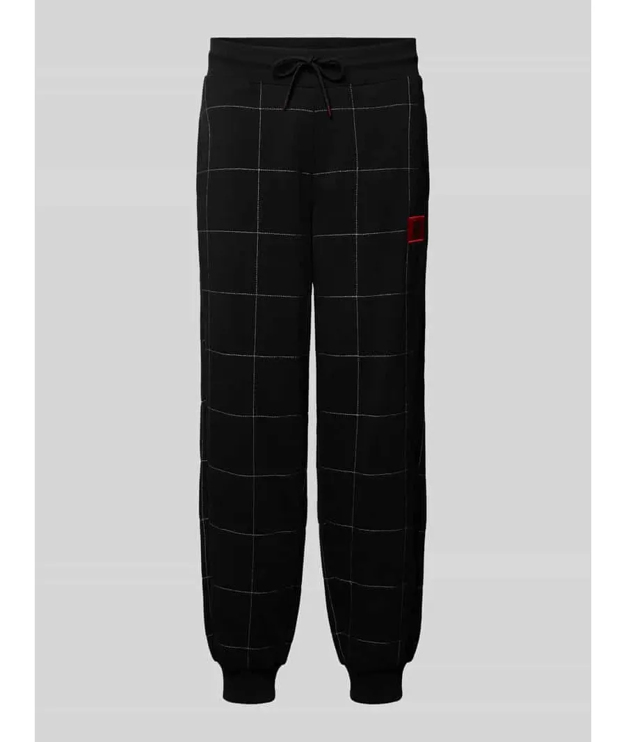 obrazek 1 Spodnie dresowe o kroju regular fit z 5 kieszeniami model ‘Drag’