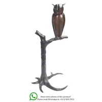 Picture An elite bronze sculpture of an owl sitting on a branch