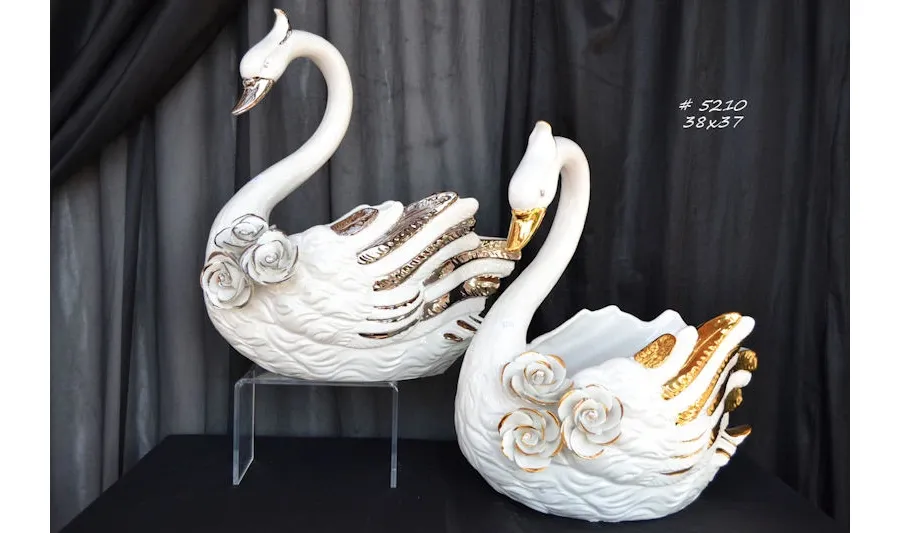 picture 1 Decorative figurines of subtle swans
