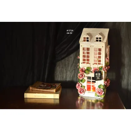 Picture Stylish ceramic decoration in the shape of a house