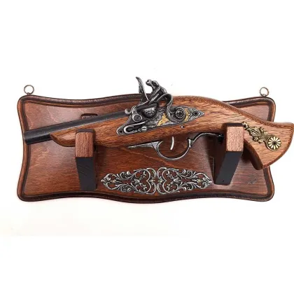 Picture A gun replica on a hanger - to hang on the wall