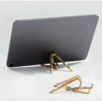 Picture An unusual brass stand for a phone or Yoga tablet