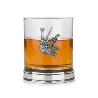 Picture A whiskey glass with a depiction of Scottish bagpipes in copper color - a stylish gift