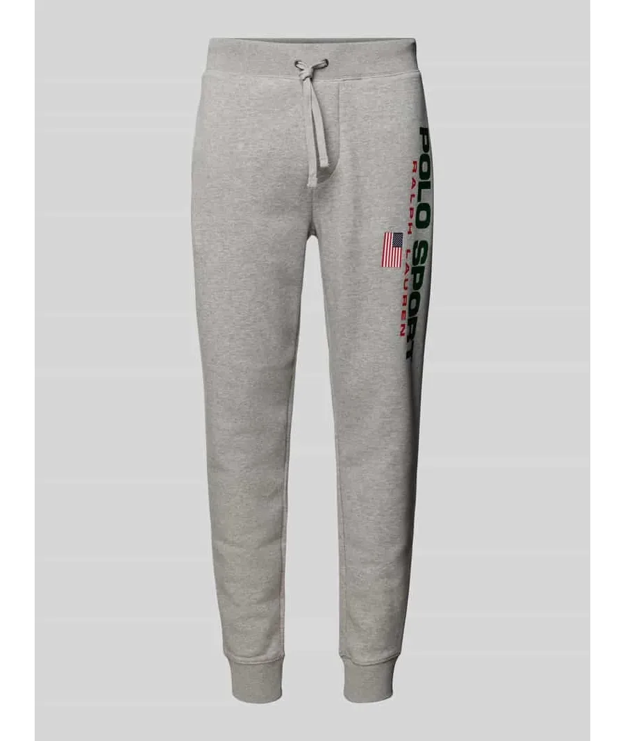 obrazek 1 Spodnie dresowe o kroju slim fit z nadrukiem z logo