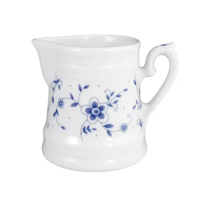 Picture A unique porcelain cream jug decorated with a decorative floral motif in a classic style - Tettau