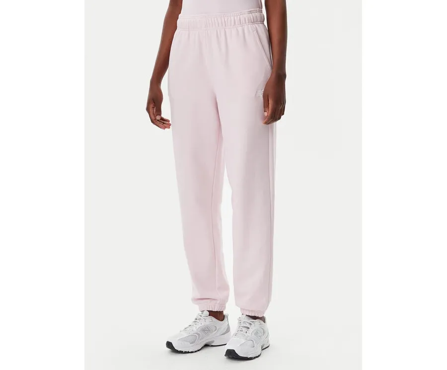 obrazek 1 New Balance Spodnie dresowe Essentials WP41500 Różowy Relaxed Fit