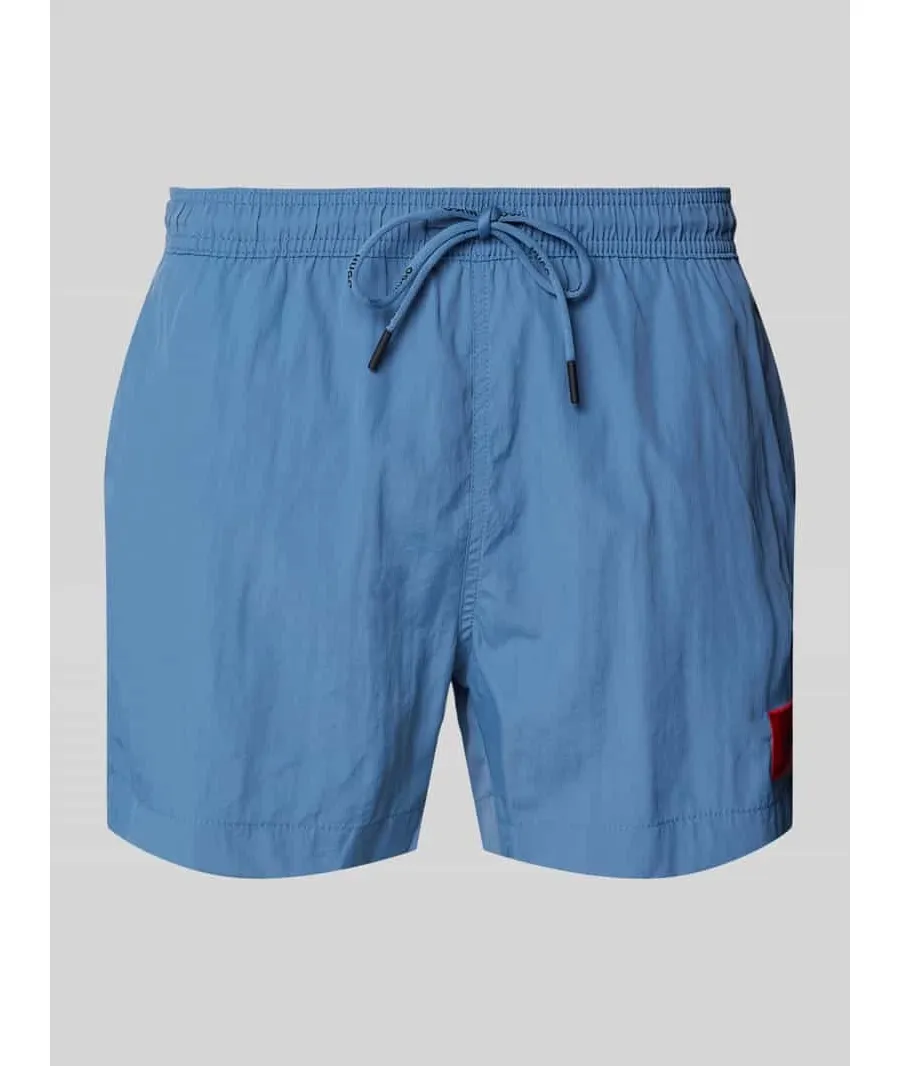 obrazek 1 Spodenki kąpielowe o kroju regular fit z naszywką z logo model ‘DOMINICA’