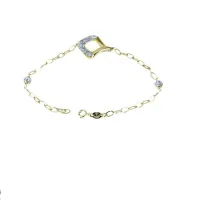 Picture A wonderful bracelet with a central twisted rhombus and balls covered with zircons