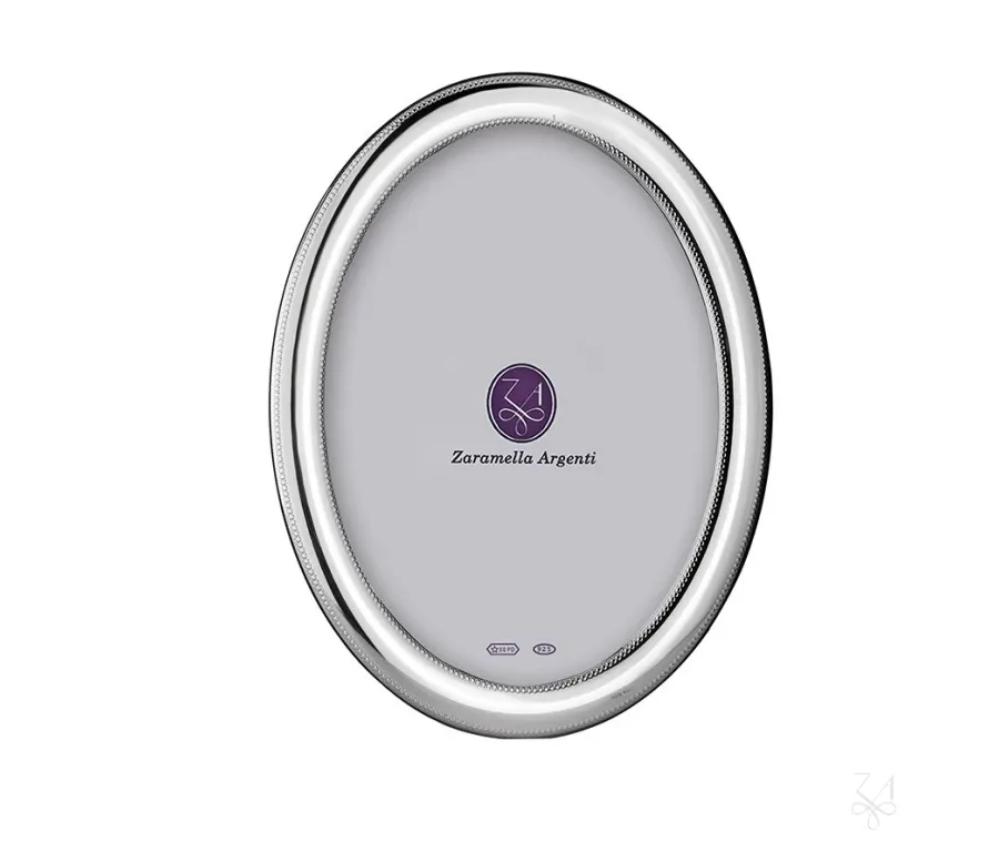 obrazek 1 Wyjątkowa owalna ramka na zdjęcia 15×20 cm Saint Michel ze srebra - Zaramella Argenti