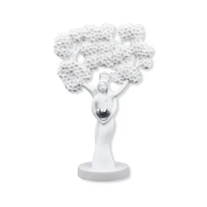 Picture A unique sculpture of the tree of life with figures