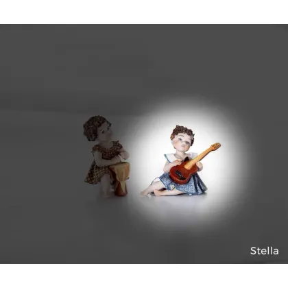 Zdjęcie Lalka dziewczynki grającej na gitarze - Sibania