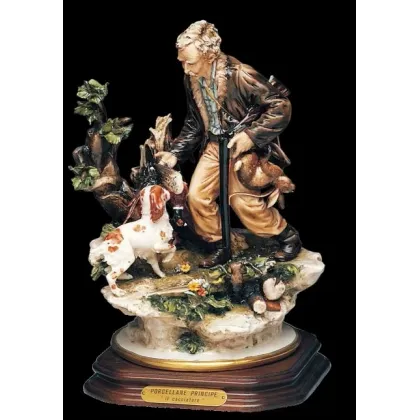 Zdjęcie Porcelanowa statuetka łowcy