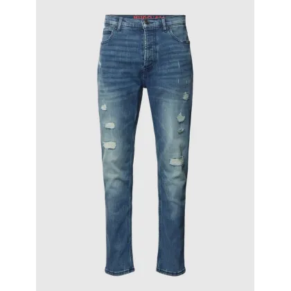 Zdjęcie Jeansy o kroju slim fit z przetarciami