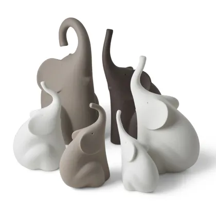 Picture A wonderful sitting elephant figurine made of ceramics in 6 sizes and colors