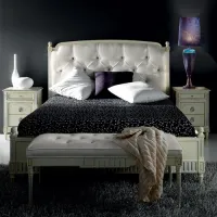 Picture Beautiful bed with an upholstered headboard