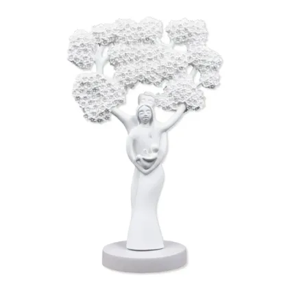 Picture A unique sculpture of the tree of life with two figures and a baby