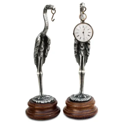 Picture A beautiful clock for an office or study with a figure of a crane