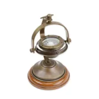 Picture A unique compass on a base made of bronze