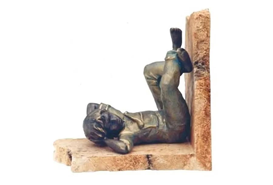 picture 1 An original bookend - lying boy