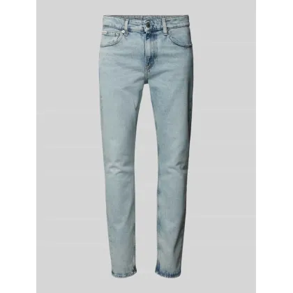 Zdjęcie Jeansy o kroju slim tapered fit z detalem z logo
