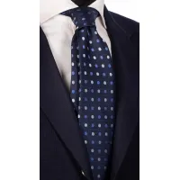 Picture Elegant navy blue tie with white and blue polka dots