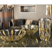 Picture Handmade crystal bowls and vase with gold decorations