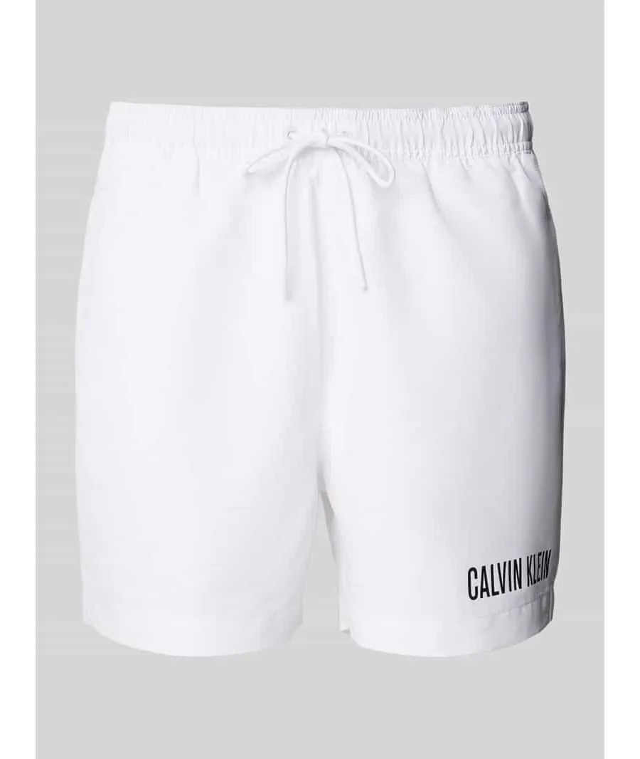 obrazek 1 Spodenki kąpielowe o kroju regular fit z nadrukiem z logo