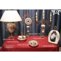 Picture A stunning ceramic beige clock with gold-plated brass