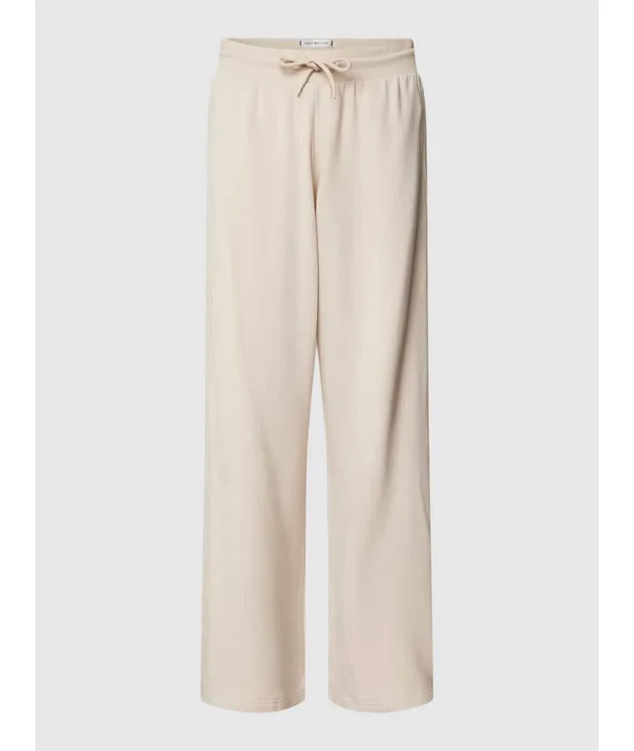 obrazek 1 Tommy Hilfiger Spodnie dresowe UW0UW04771 Beżowy Relaxed Fit