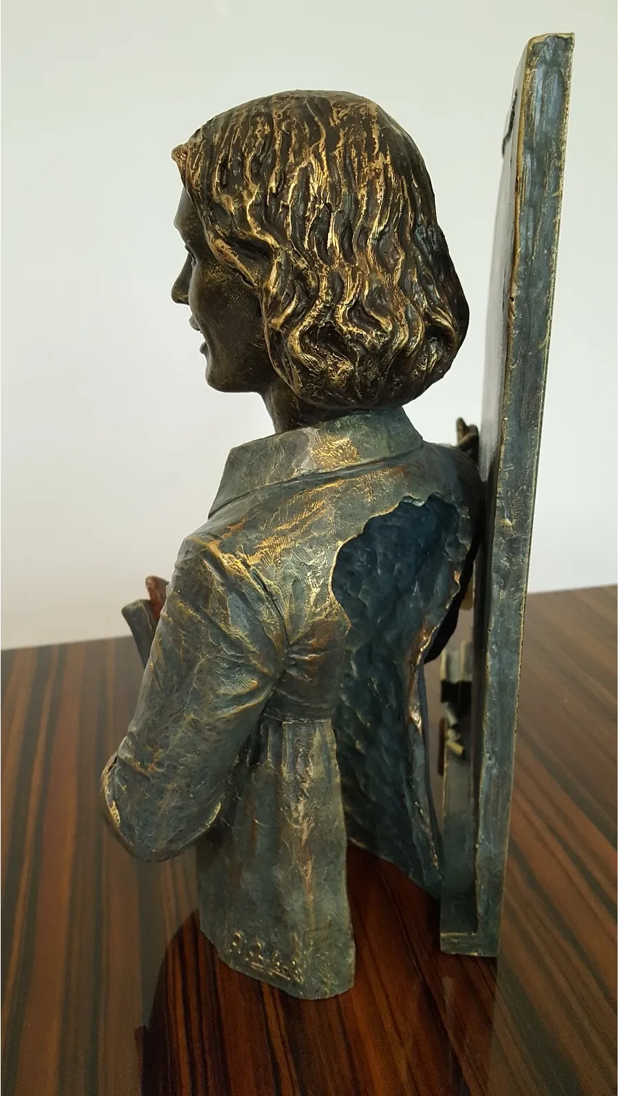 picture 7 A beautiful statue of a teacher at the blackboard