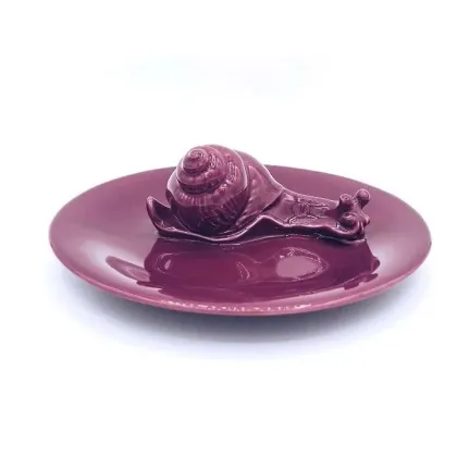 Picture Ceramic decorative plate with a snail figurine