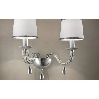 Picture An avant-garde wall lamp for the hall in a gold or silver finish