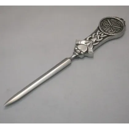 Picture A unique letter opener decorated with a Claddagh pattern and a trinity knot