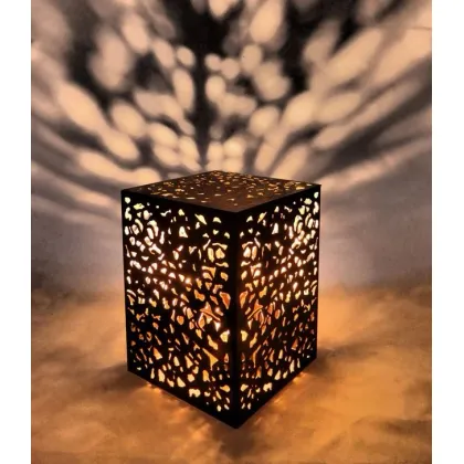 Picture A modern cube-shaped desk lamp