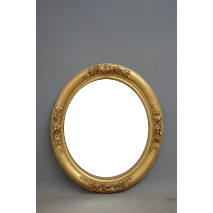 Zdjęcie Atrakcyjne owalne lustro ścienne z XIX wieku w kwiecistej rzeźbionej złoconej ramie - antyk