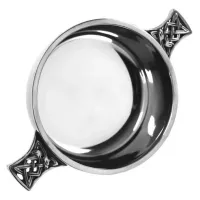 Picture An unusual snack bowl with decorative handles
