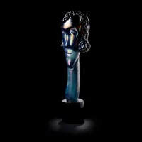 Picture Opalescent steel head on a black Murano base