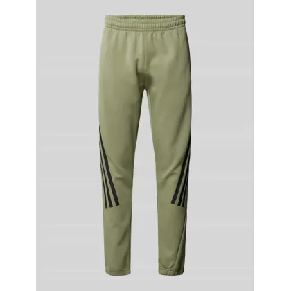 Zdjęcie Spodnie dresowe o kroju tapered fit z charakterystycznymi dla marki paskami