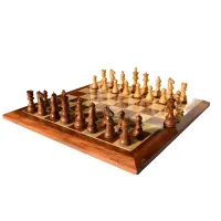 Picture A stylish wooden board with chess pieces, perfect as a gift - The Chess Empire