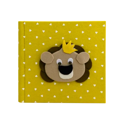 Picture Original child development journal with a yellow cover with a lion