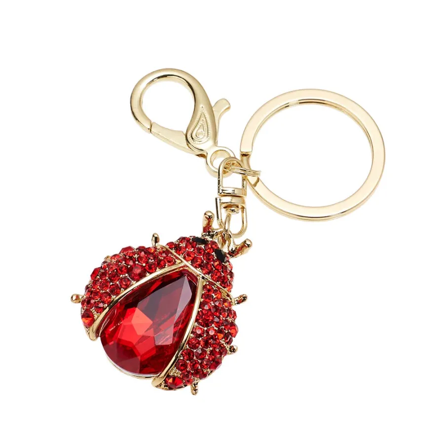 picture 1 Stylish gold keychain with crystals and zircons