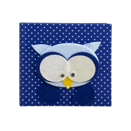 Picture A unique child development journal with a cover with a blue owl