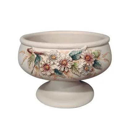 Picture Italian ceramic plate with a floral relief